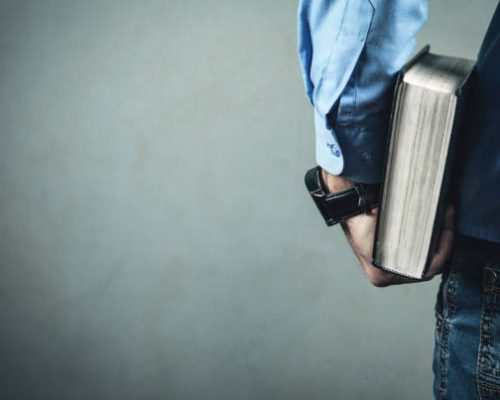 Caucasian man holding bible. Caucasian man holding bible.